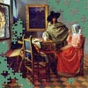 A new jigsaw puzzle from BrainsBreaker, free for all. This time it's a painting by Johannes Vermeer, "The Glass of Wine". Play it with as many pieces as you want